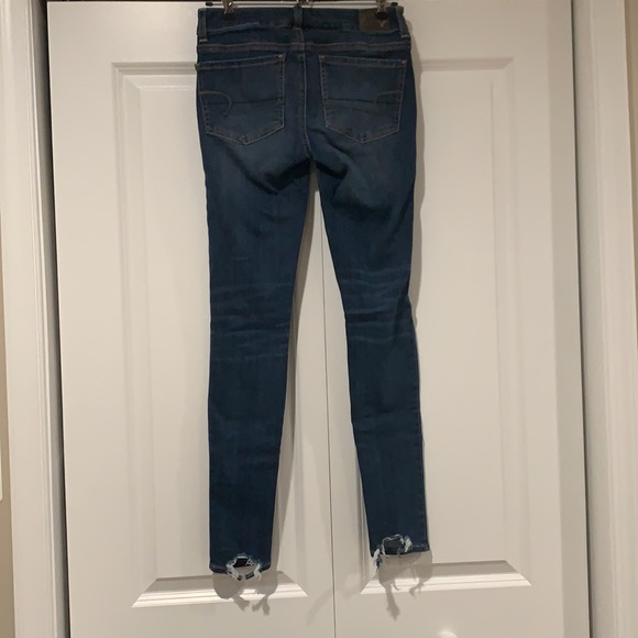 Distressed Mid-Rise Jegging - Picture 2 of 4